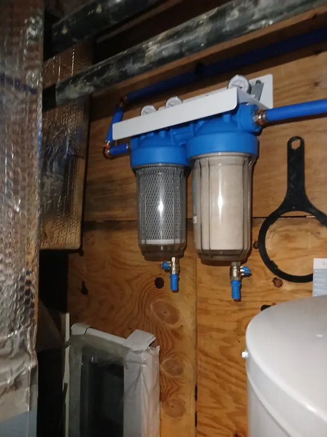 Whole-house dual filter housings