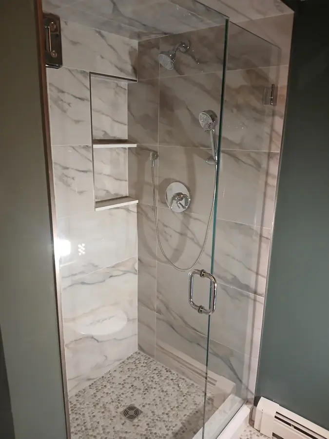 Tiled glass shower installed by Greenlight